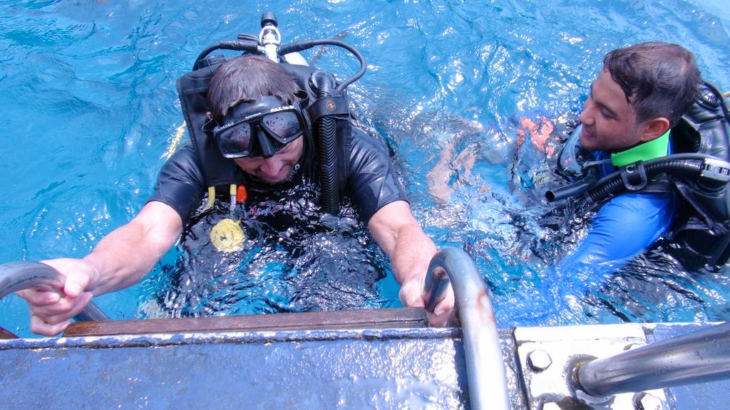 Beginner diver exits deep water